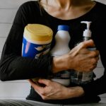 A local service provider gathering cleaning supplies, representing local service providers in Calgary available through Djobzy